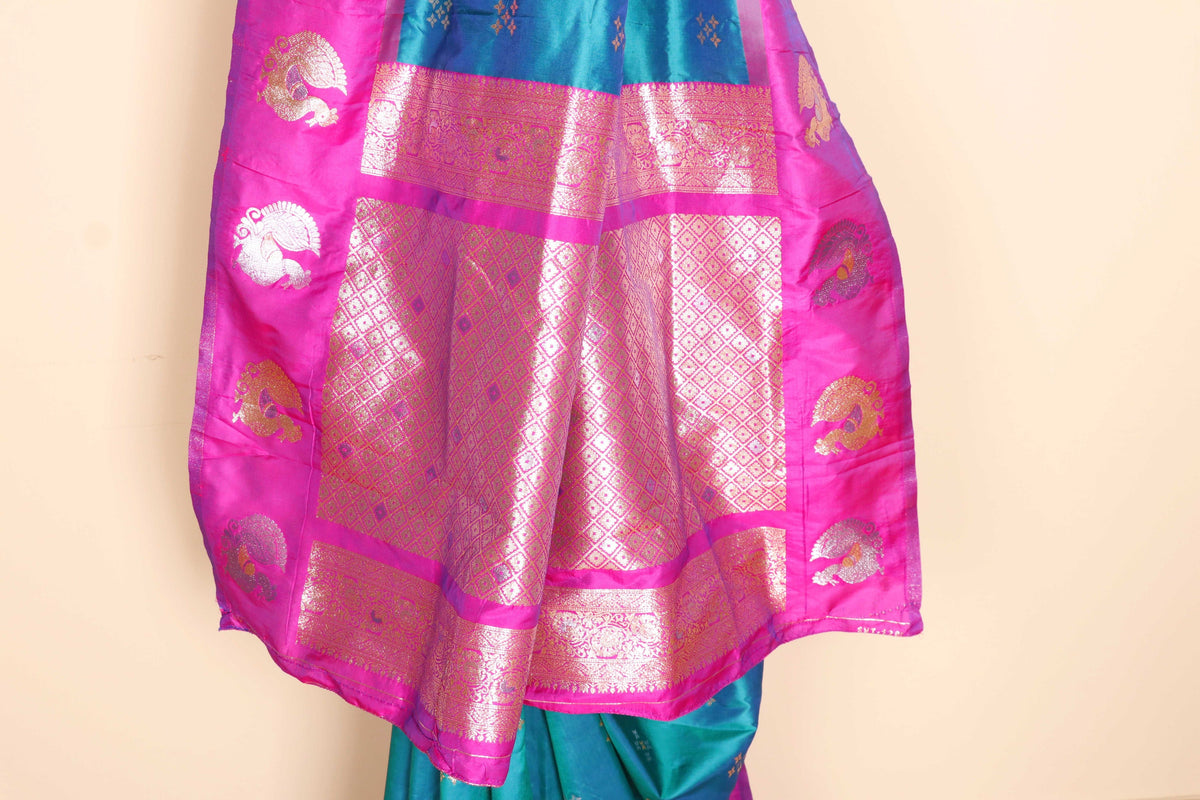 Mor Pankhi Soft Silk Saree with Rani Pink Border Gold Zari Peacock Fan Motifs and Cross Butti | 1057