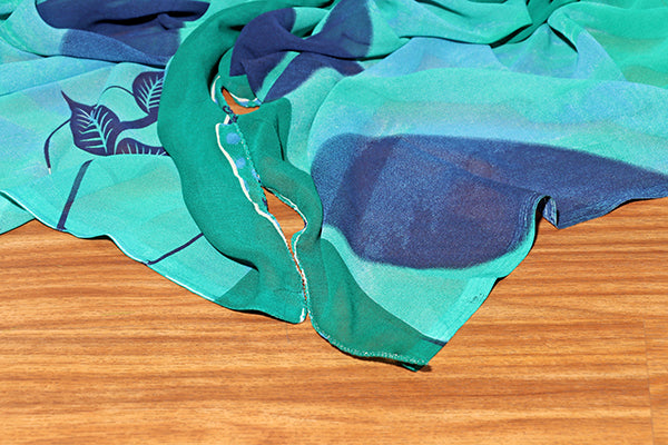 Tropical Whisper – Aqua Leaf Georgette Saree (New 331-R-325)