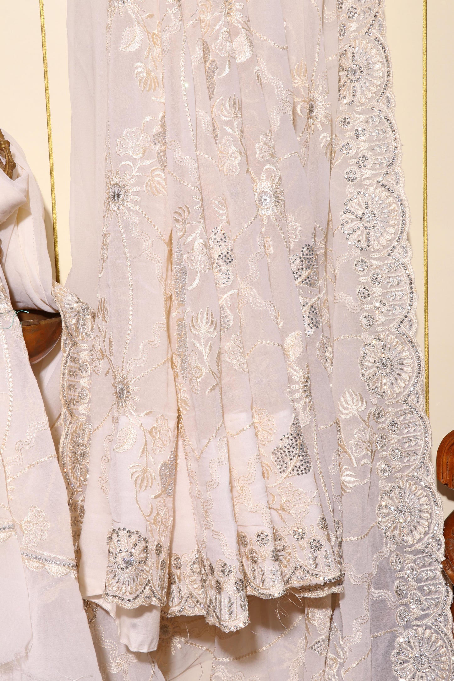 Ivory Radiance Embroidered Georgette Saree Description 083