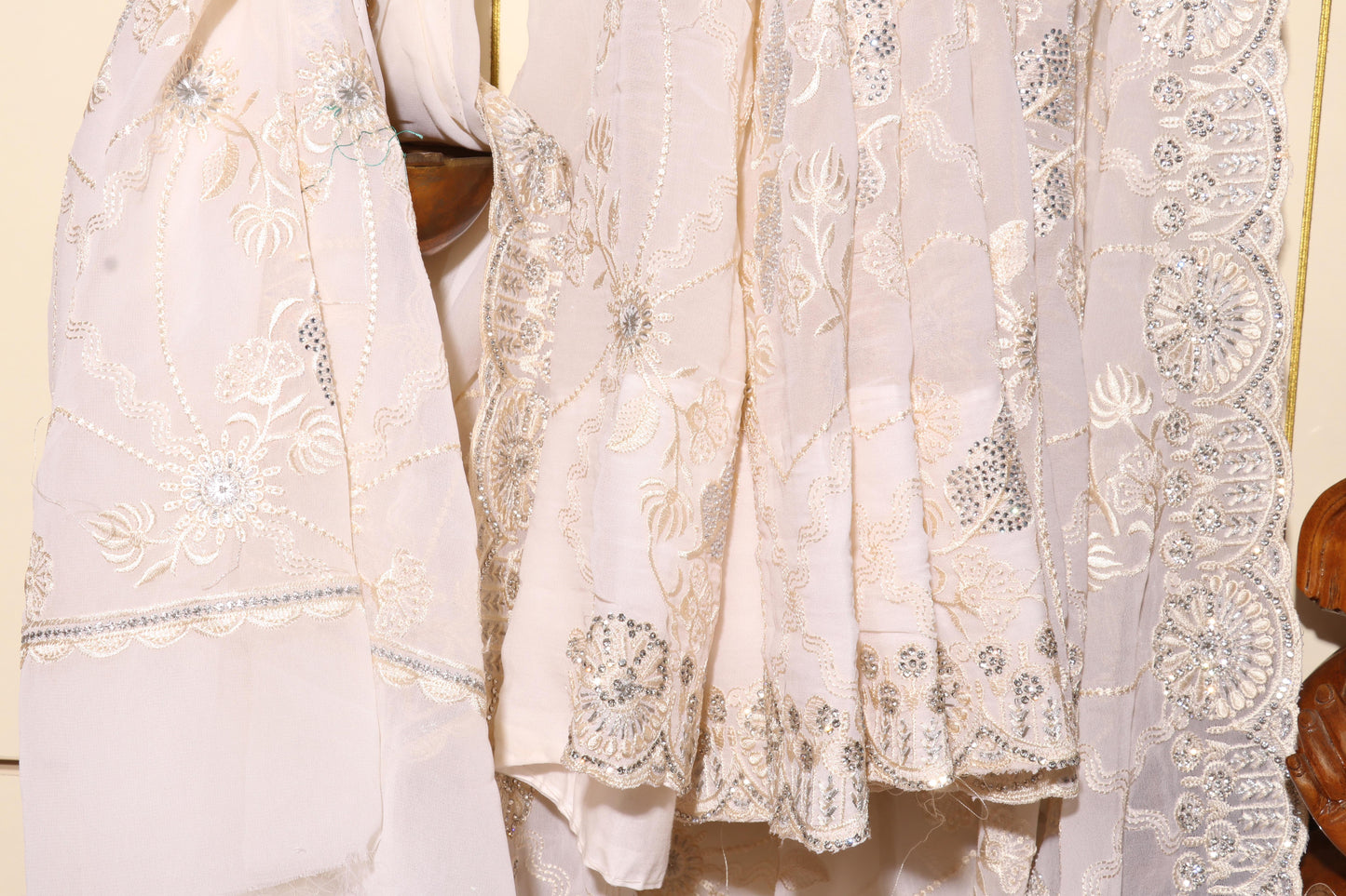 Ivory Radiance Embroidered Georgette Saree Description 083