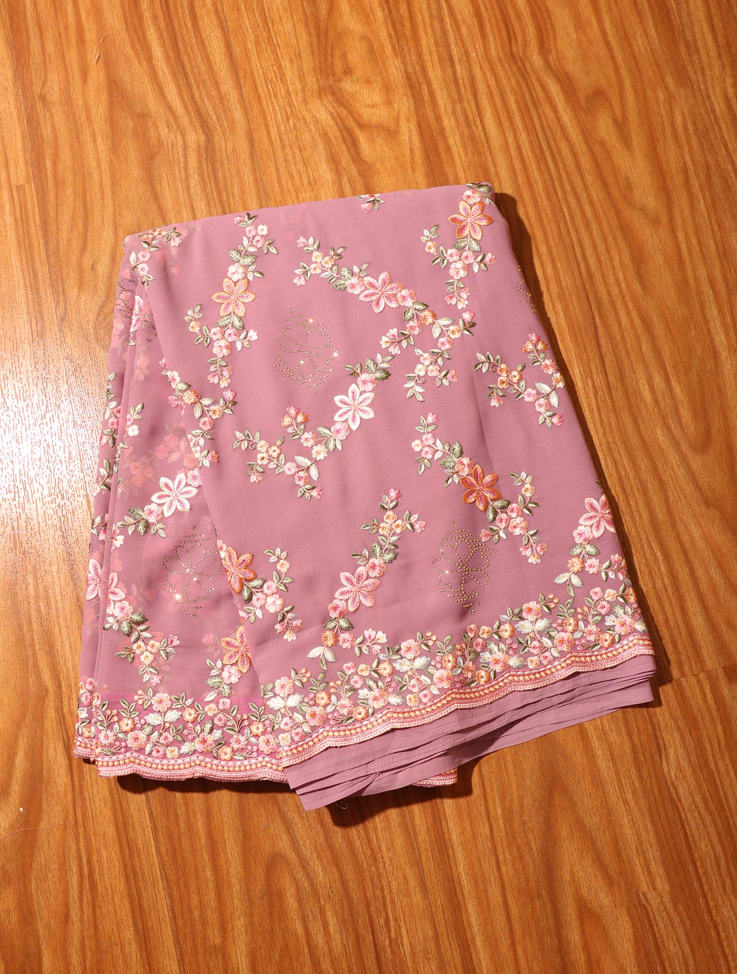 Malvika - A Soft Mauve Georgette Saree 151