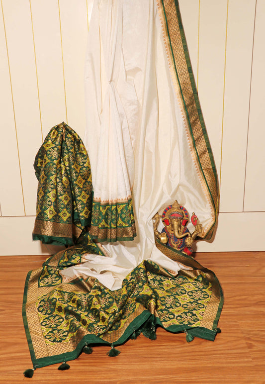 White Handloom Khadi Silk Saree with Bottle Green Patola Zari Border and Pallu 109