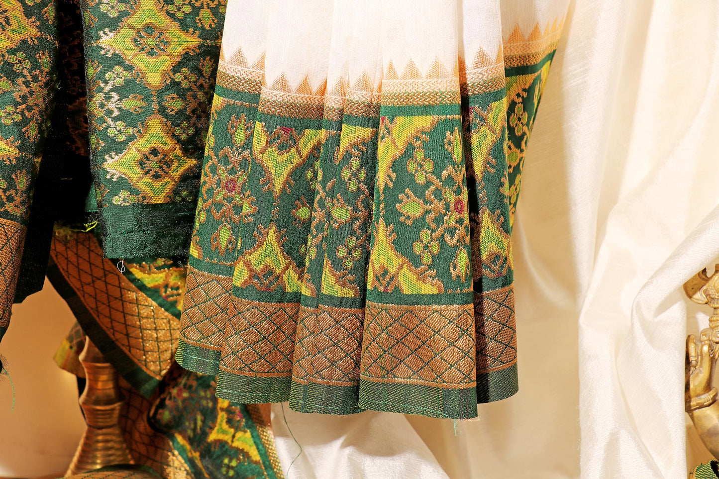 White Handloom Khadi Silk Saree with Bottle Green Patola Zari Border and Pallu 109