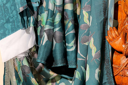 Teal Georgette Saree with Sabyasachi-Style Floral Print and Swarovski Border 110