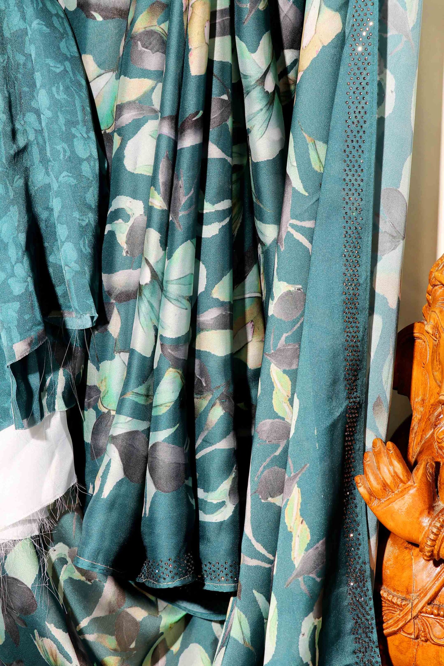 Teal Georgette Saree with Sabyasachi-Style Floral Print and Swarovski Border 110