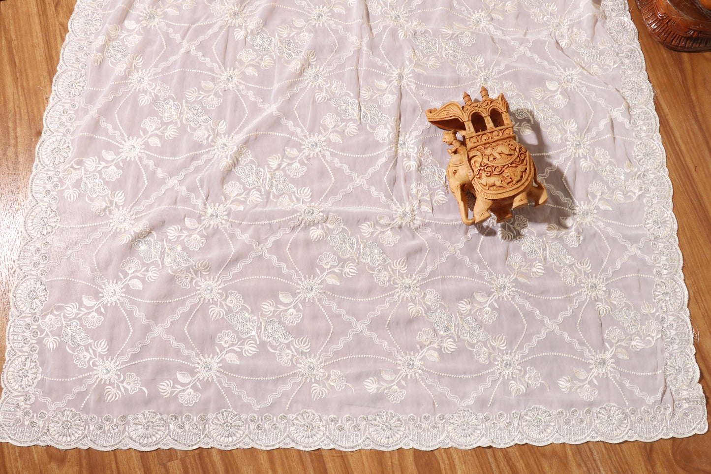 Ivory Radiance Embroidered Georgette Saree  Description 083