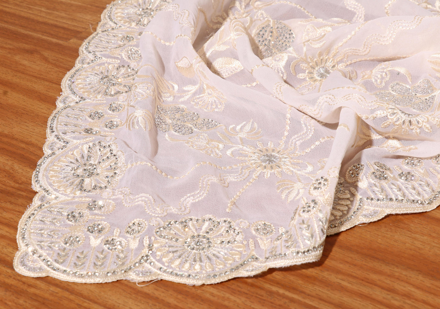 Ivory Radiance Embroidered Georgette Saree  Description 083