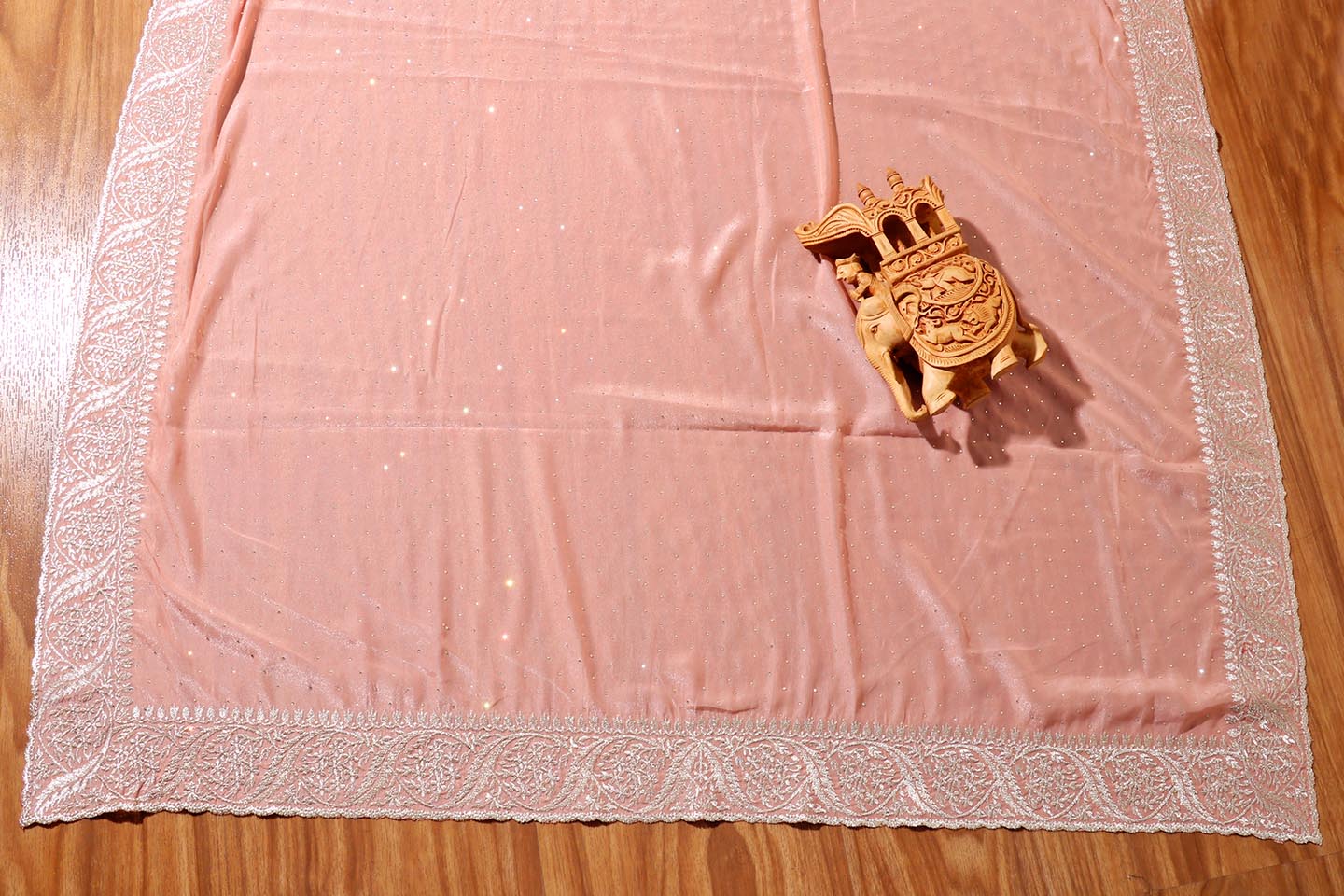 Varnika – Peach Satin Georgette Saree with Silver Embroidery 136
