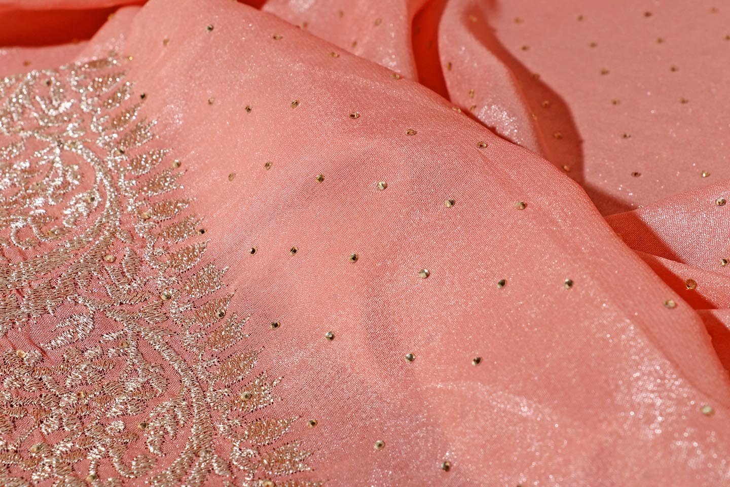 Varnika – Peach Satin Georgette Saree with Silver Embroidery 136
